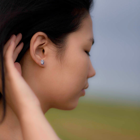 Silver stud earrings with Rough Rose Quartz