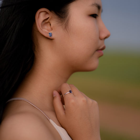 Silver stud earrings with Rough Tanzanite